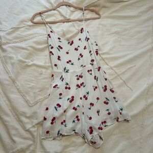 Millau White Romper with Red and Green Cherry Print LF Stores